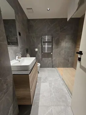 a bathroom with a sink and a toilet at Waterfront Studio Blue Lagoon in Belgrade
