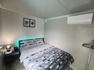 a bedroom with a bed in a room at Niki Hill in Železnička Stanica Karlovački Vinogradi