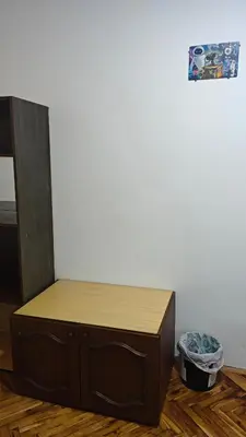 a wooden box sitting on the floor in a room at hometown in Pančevo