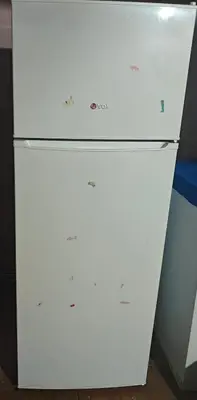 a white refrigerator with four drawers in a room at hometown in Pančevo