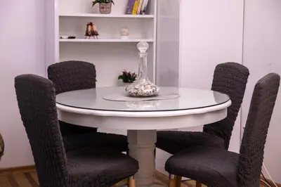 a white dining room table with chairs around it at Old Town Panorama in Belgrade