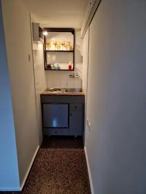 a small bathroom with a sink and a counter at Gallery House in Belgrade
