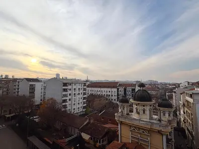 a building with domes on top of it in a city at SARA Lux Novi Dorcol in Belgrade