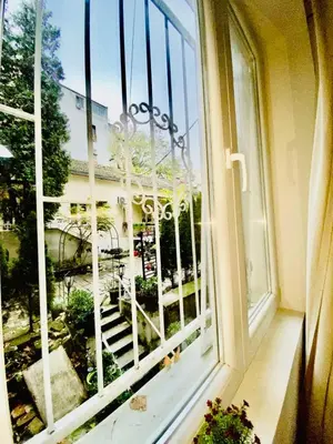an open window with a view of a building at Center Belgrade in Belgrade