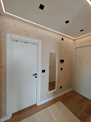 a room with a white door and a mirror at Belgrade Waterfront Primestay in Belgrade