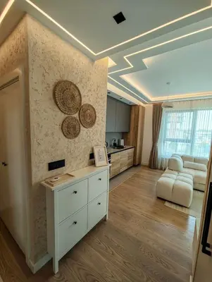 a large room with a kitchen and a living room at Belgrade Waterfront Primestay in Belgrade