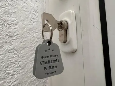 a key chain is attached to a door at Guesthouse Vladimir & Ana in Pančevo