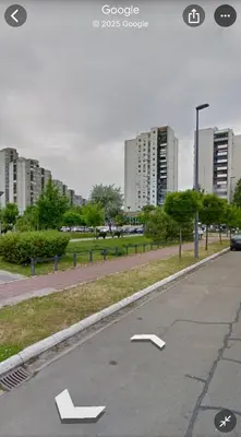 an empty parking lot with arrows on a city street at Bright Elegant Cozy Apartment - New Belgrade in Beograd