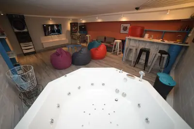 a living room with a large white tub in a room at City Place Apartments in Belgrade