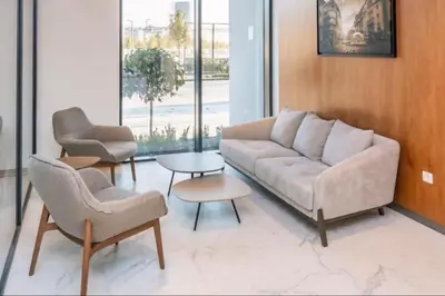 a living room with a couch and two chairs and a table at Belgrade Waterfront Lux Apartments in Belgrade