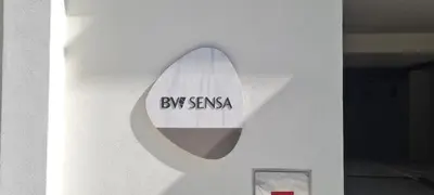 a mirror on the side of a wall with a surfboard at Belgrade Waterfront - Beograd na vodi in Belgrade