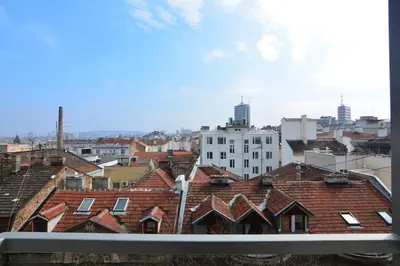 a view of a city with roofs and buildings at Apartment Dositejeva 13 in Belgrade
