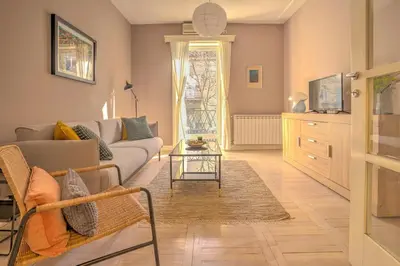 a living room with a couch and a table at Kalemegdan Central Apartment II in Belgrade