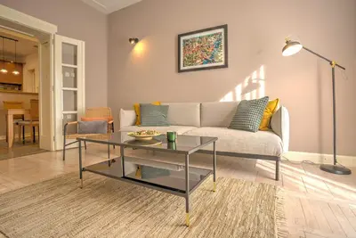 a living room with a couch and a table at Kalemegdan Central Apartment II in Belgrade
