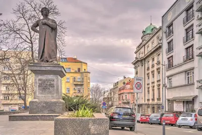 a statue in the middle of a street with cars at Kalemegdan Central Apartment II in Belgrade