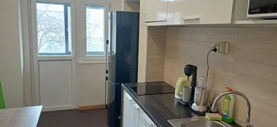 a kitchen with a sink and a counter top at LP apartment in Belgrade