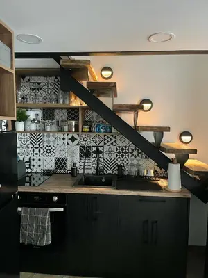 a kitchen with a sink and a counter top at City Loft in Belgrade