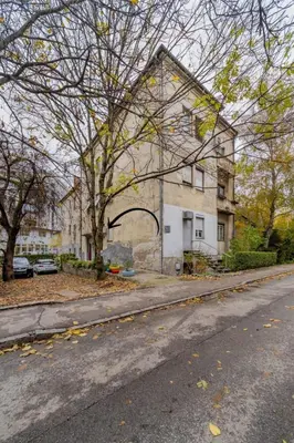 an old house on the side of a street at Nele Belgrade Apartment in Belgrade