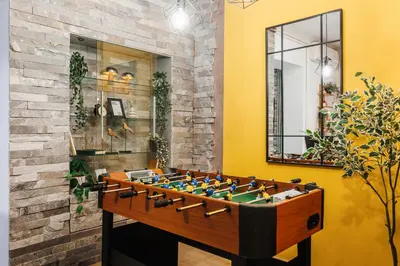 a game room with a foos ball at Foosball Frontyard Retreat Old Town in Belgrade