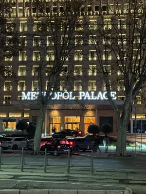 a building with a sign on the front of it at Panajota Apartment in city centre in Belgrade