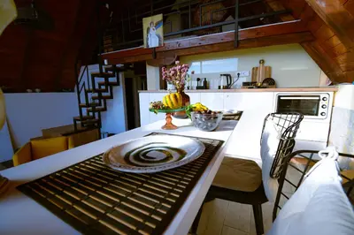 a kitchen with a table with a plate on it at Kosmaj Escape in Koraćica