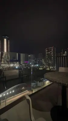 a view of a city at night from a building at Belgrade Waterfront luxury apartment & free parking in Belgrade