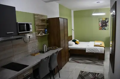 a small room with a small bedroom with a bed at Villa 1869 Zemun in Belgrade