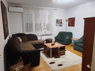 a living room with a couch and a coffee table at Signorina in Smederevo