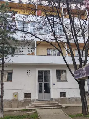 a white building with a door in front of it at Signorina in Smederevo