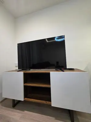 a white entertainment center with a flat screen tv on it at Masa in Arandjelovac