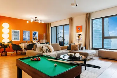 a living room with a pool table in it at WF Sky Charm with Terraces & Billiard in Belgrade