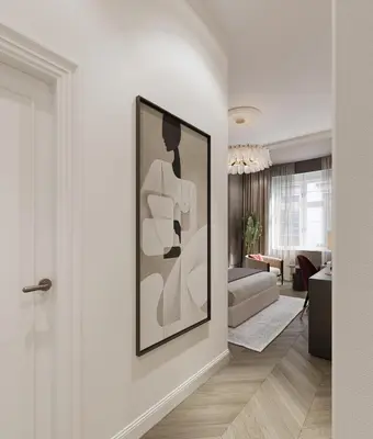 a living room with a painting on the wall at White Gallo Residences in Belgrade