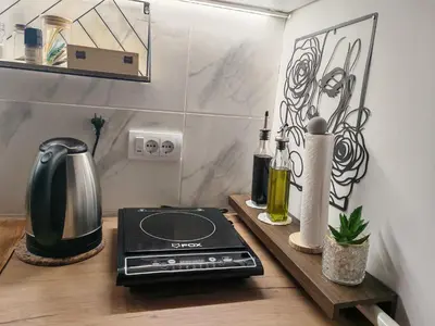 a kitchen counter with a toaster and a stove at Kalemegdan 2 in Belgrade