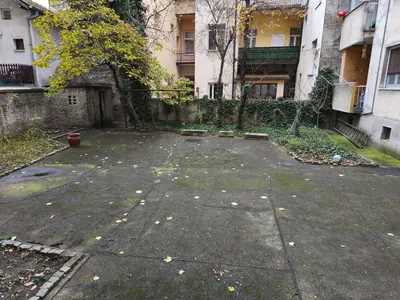 an empty parking lot in front of a building at Cozy one in Belgrade centre in Belgrade