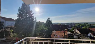 a view of a city from a balcony at ETA Apartments in Belgrade