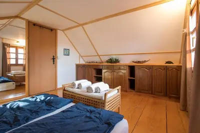 a bedroom with two beds in a room at Morning Star River Retreat - A Boathouse in Belgrade in Belgrade