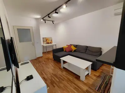 a living room with a couch and a table at Fontana in Belgrade
