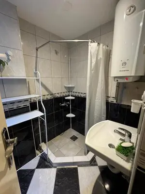 a bathroom with a shower and a sink at BelgradeCenterVibe in Belgrade
