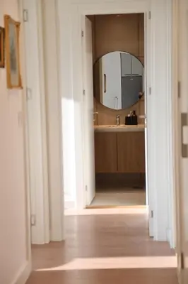 a bathroom with a mirror and a sink at BW Premium Apartment Wolf-free parking in Belgrade