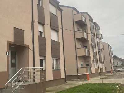 an apartment building with balconies on the side of it at Teja- new apartment for 4 person with free parking space in Belgrade