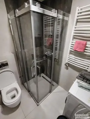 a bathroom with a shower and a toilet at Furkan Home in Surčin