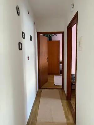 a hallway with a door leading to a room at Kneginje Ljubice apartment in Belgrade