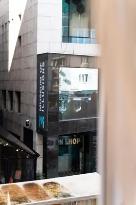 a building with a sign that reads my shop at Luxury Apartment Old Town City Center in Belgrade