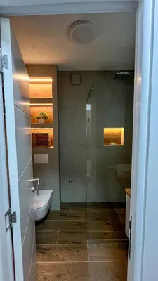 a bathroom with a shower and a toilet and a sink at LUX apartment 15 min walk to Knez Mihajlova in Belgrade