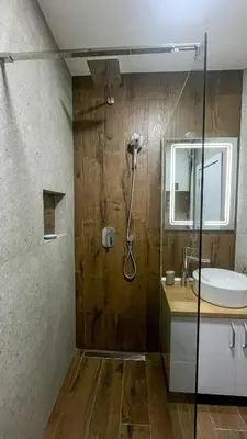 a bathroom with a shower and a sink at LUX apartment 15 min walk to Knez Mihajlova in Belgrade
