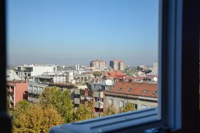a view of a city from a window at LUX apartment 15 min walk to Knez Mihajlova in Belgrade