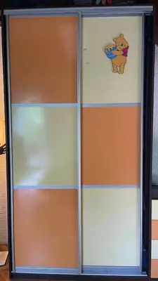 a cabinet with a cow on the wall at vila filip in Belgrade