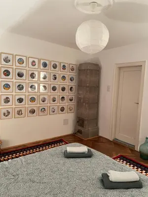 a room with a large bed with two pillows on it at Nomad and Home apartment in Belgrade