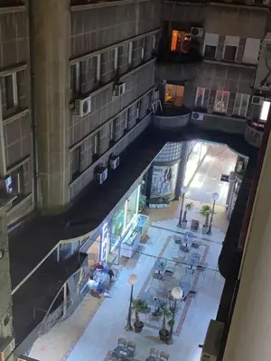 an overhead view of a building with tables and chairs at Verdi Apartment in Belgrade