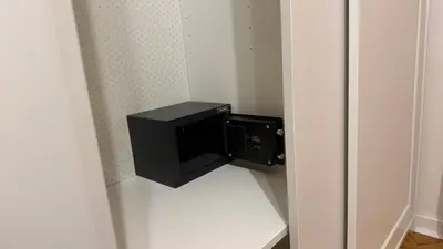 a small television in a corner of a room at GardosHouse Apt 2 in Belgrade